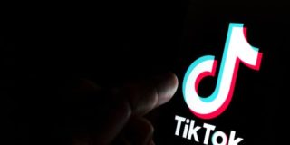 tiktok logo in dark